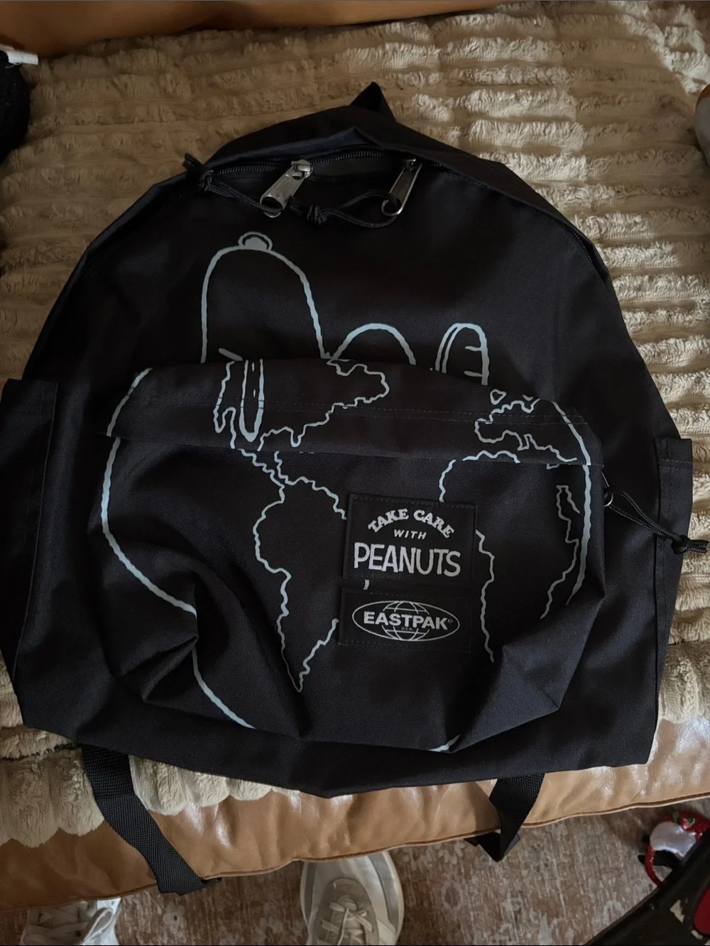 Eastpak Black Backpack with White Peanuts Graphic